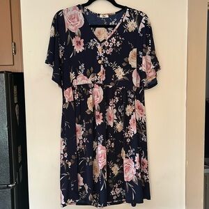 Loose fitting babydoll dress with pockets. Never worn!
